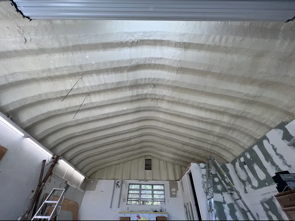Spray polyurethane foam applied to the underside of a metal roof deck in Winter Garden